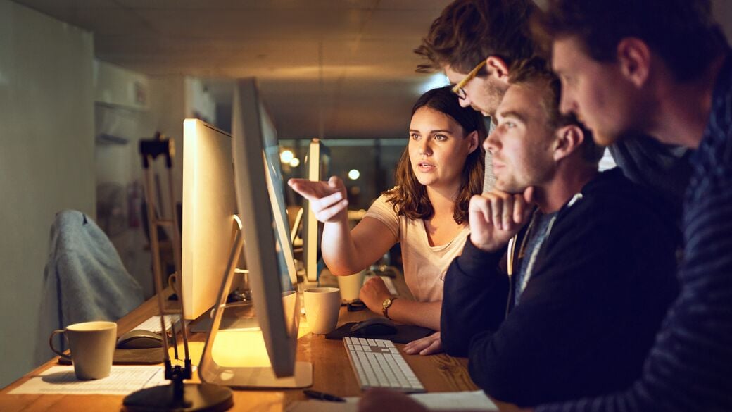 Group of designers working in the office Group of designers working in the office