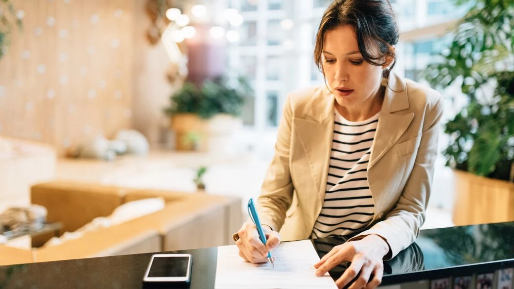Woman making checklist
