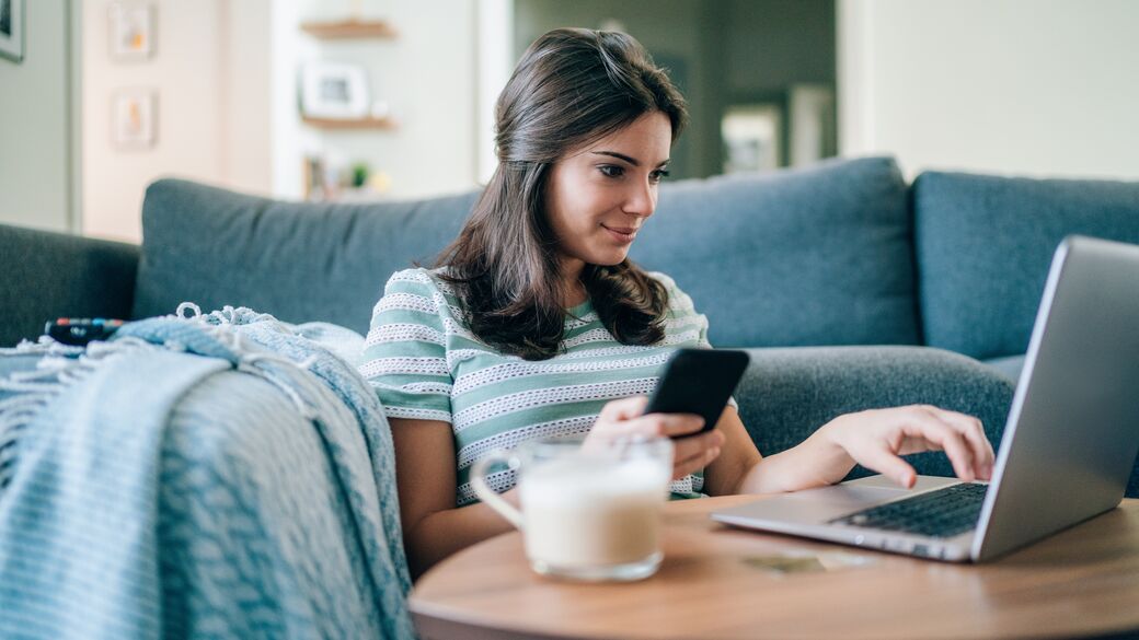 Young woman surfing the internet at home Young woman surfing the internet at home